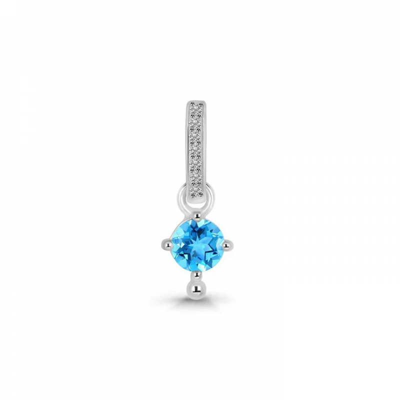 How To Pick Swiss Blue Topaz Jewelry That'll Complement Your Wedding Dress: 