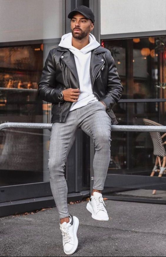 Black Biker Jacket, Winter Attires Ideas With Grey Casual Trouser, White Hoody: 