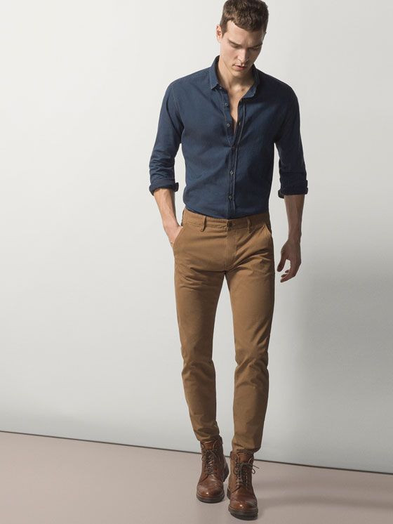 navy blue shirt and brown pants