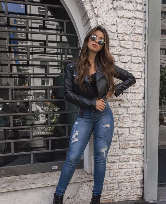 Stylish Baddie Outfits:  Black Leather Jacket, Ripped Skinny Jeans, Lace-up Boots for a Casual Chic Streetwear Look.