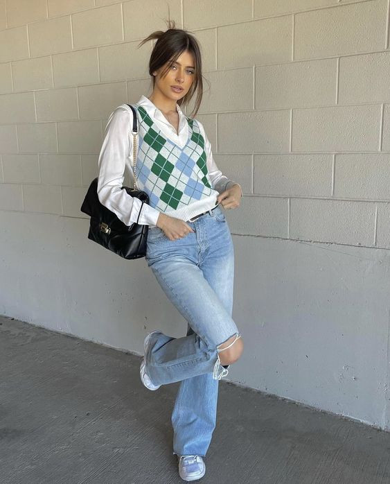 A Nod to the '90s with a Vibrant Green and White Sweater Vest and Relaxed Denim: 