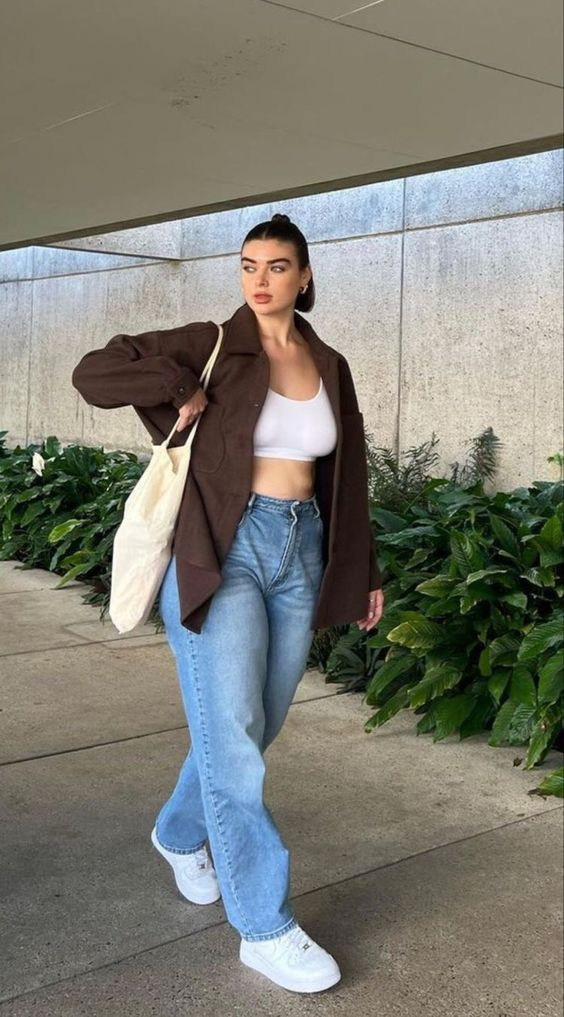 She's just keeping things chill and comfy in her light wash jeans and white crop top!: Jeans,  Wide-Leg Jeans,  who what wear,  Mom jeans,  high-rise  