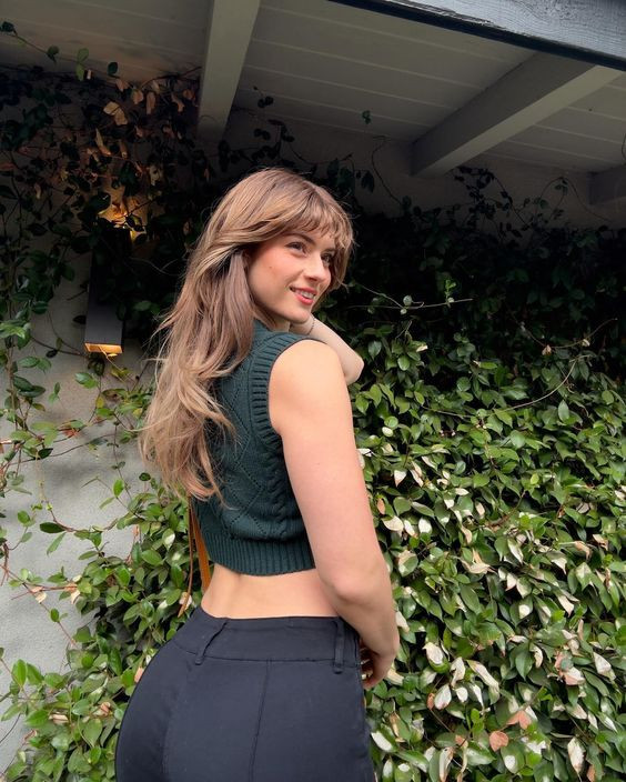 Faith Ordway is making us do a double-take with her hot green attire against the wall of leaves: Internet celebrity,  faith ordway  