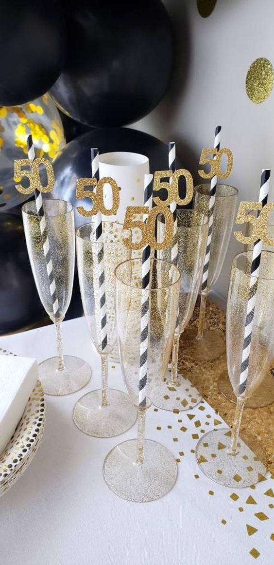 Sipping on Half a Century with Gold-Dusted Glasses!: champagne stemware,  champagne stemware,  glitter cake,  wine glass  