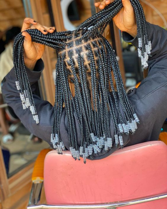 Check out that crystal bead cascade on a bed of knotless black silk. Sounds luxurious, right?: Box braids,  Black hair  