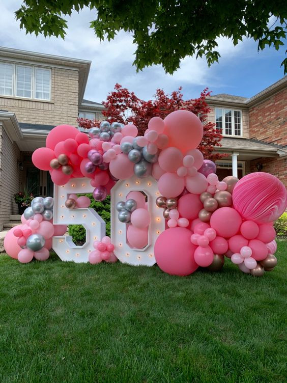 Wow, have you checked out the awesome decoration at 'A Blush of Pink and Silver Sparkle for a Luminous Fifty'?: 50th birthday decorations for outside house,  50th birthday balloons,  balloon modelling,  toy balloon  