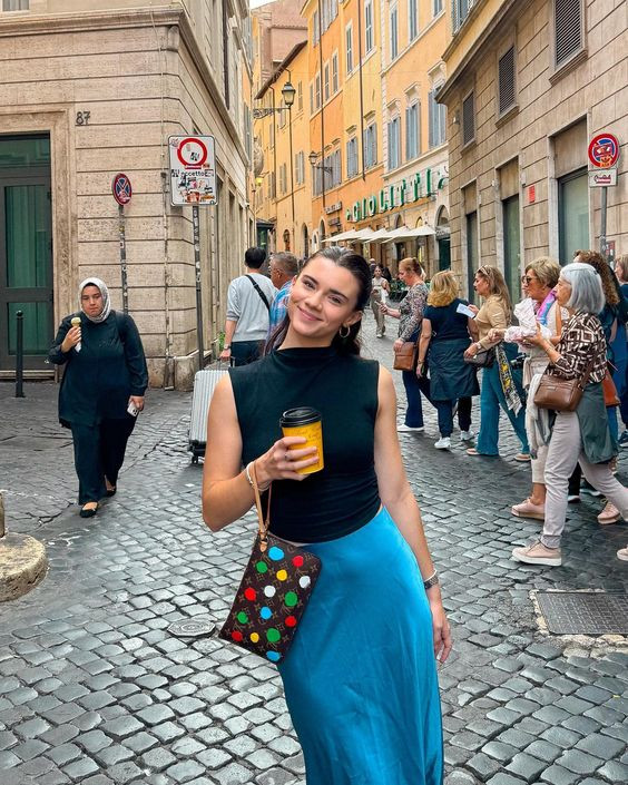 Oh, isn't she just killing it with her sexy style and that refreshing drink? Makes you want to join in, doesn't it?: brett cooper fiance,  luggage and bags,  the daily wire,  film festival,  brett cooper,  road surface  