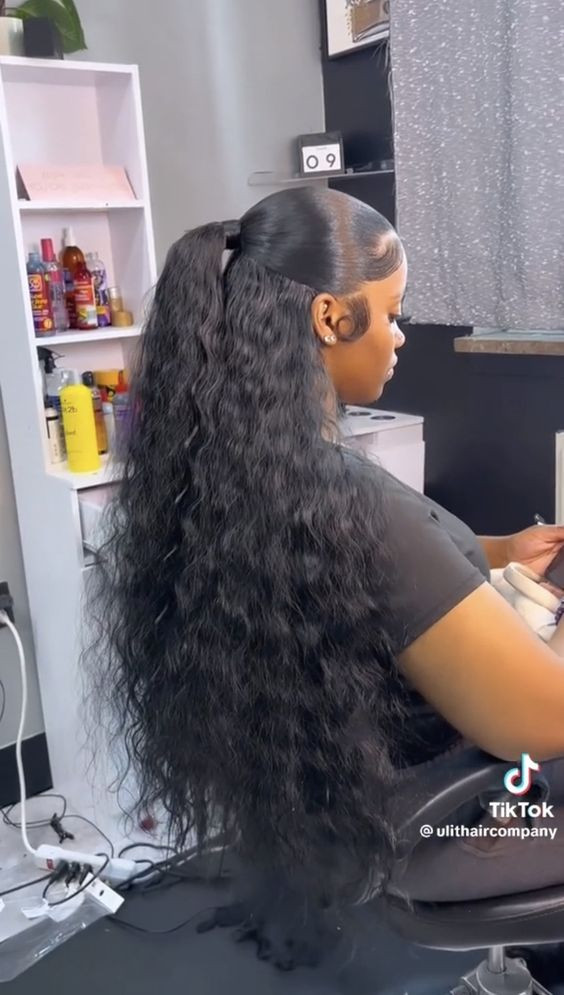This Textured Ponytail Could Be Your Secret Weapon for Prom: low half up half down weave,  artificial hair integrations,  Fashion accessory,  personal grooming,  irresistible me,  hair extension,  Layered hair,  step cutting,  Black hair,  Long hair  