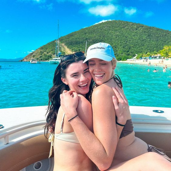 Their bikinis and big smiles are definitely making the sea sizzle!